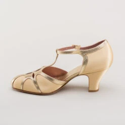 American Duchess Lilith Women's Vintage Flapper T-Straps Wide (Gold/Gold) 26 American Duchess Lilith Women's Vintage Flapper T-Straps Wide (Gold/Gold) -StrideOne Store lilith 1920s flapper shoes gold gold 7 f84e0849 614c 45b8 98b6 eb446d49b592